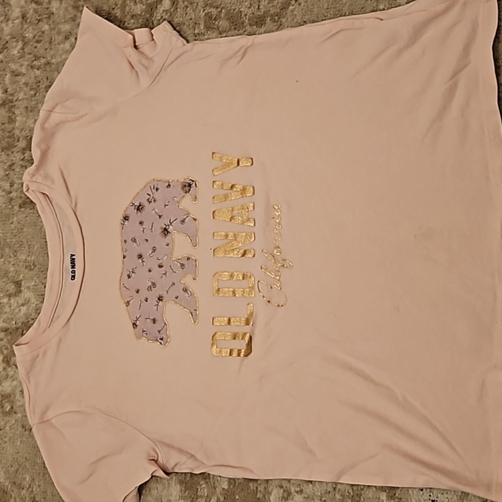 It is a cute old navy XL for kids and is pink